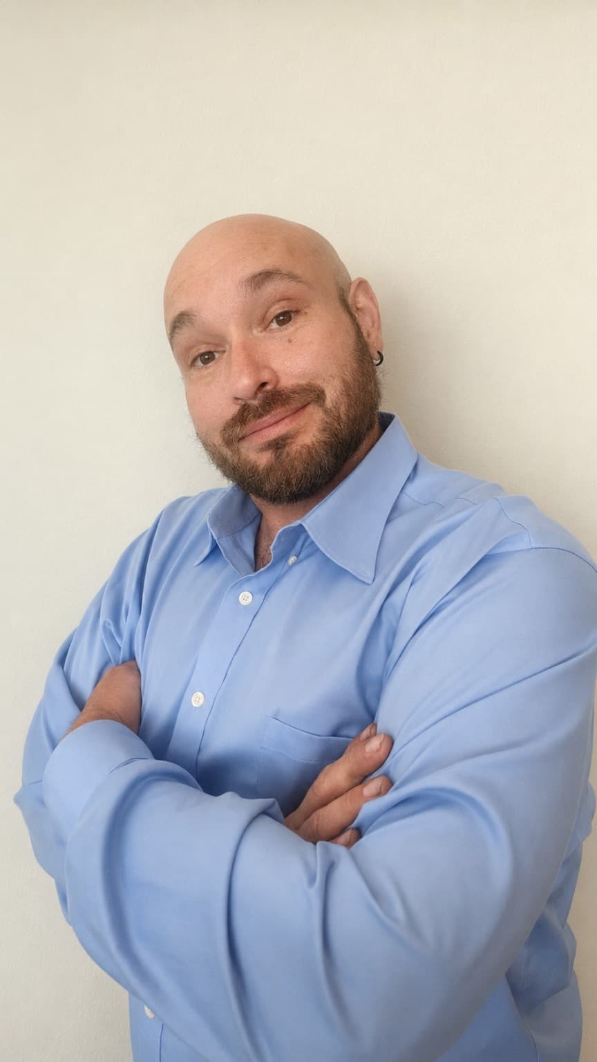 Clean professional portrait of fantasy author Alexander Dean